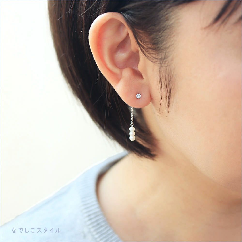 金属アレルギー対応のセカンドピアスダイアモンド３ｍｍとバックキャッチを合わせたお出かけイメージの写真