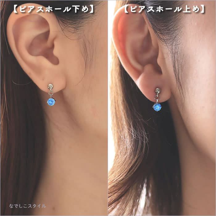 純チタン使用の、エクラ「CZマリンブルー」/ジルコニアがゆれるスタッドピアスを耳につけた女性の画像