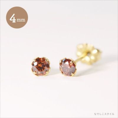 ゴールドカラーブランデートパーズ４ｍｍを正面と斜め横に置いた画像