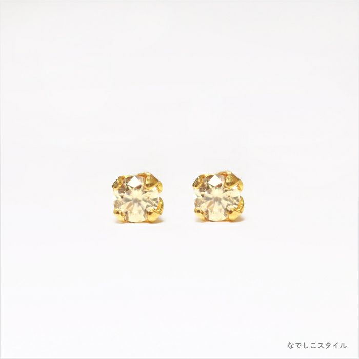 お仕事や学校で使えるチタン純度99.5％のチタンピアス、ゴールド軸の一粒キュービックジルコニアゴールドカラー「シャンパンダイア」２mm、正面からの画像